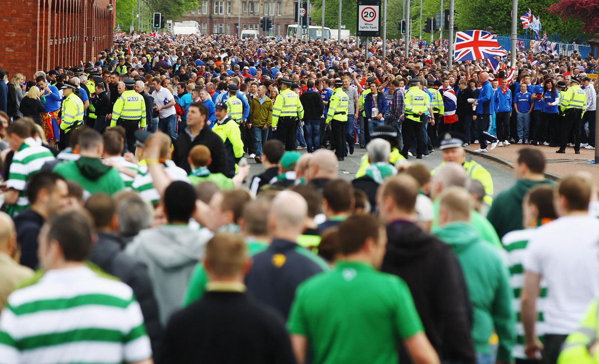 02-Rangers-and-Celtic-Fans-on-their-way-to-a-mtach-(Scottish-Sun)