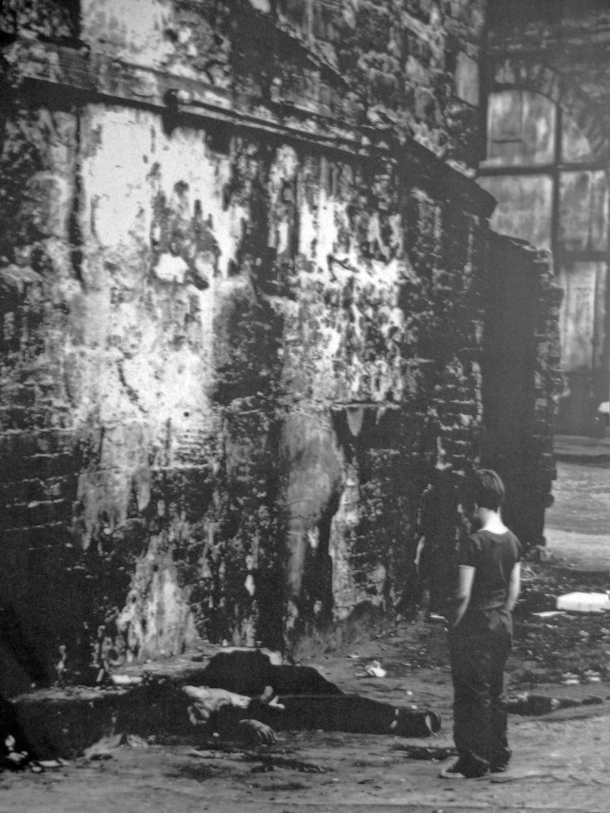 013-A-Picture-in-the-People's-Palace-of-a-Young-Boy-looking-down-on-a-drunk-in-the-streets-of-Glasgow