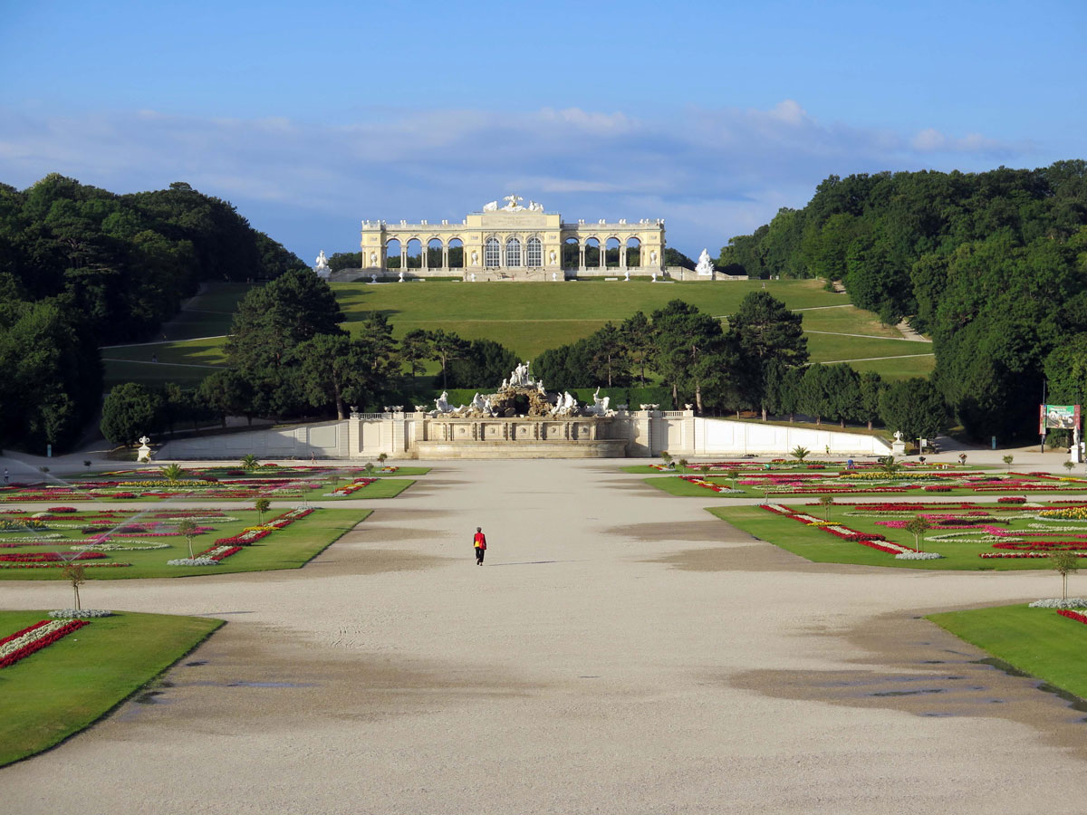 05-A-Lone-Figure-walks-up-through-the-Great-Parterre-towards-the-Gloriette